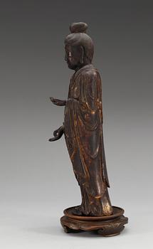 A Japanese lacquered wooden figure of Kannon Bosatsu, Muromachi/Momoyama period, 16th Century.