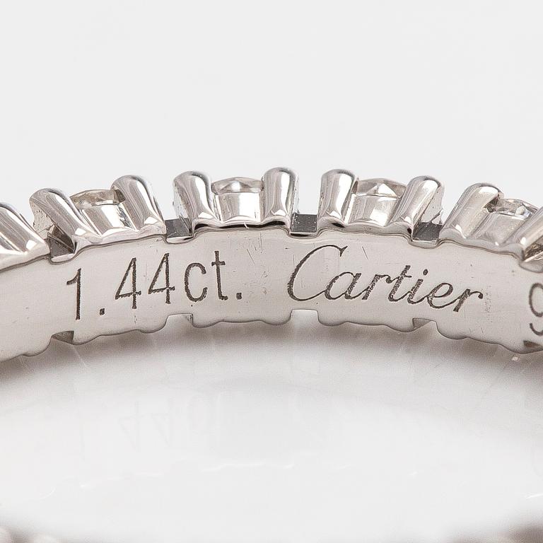 Cartier, a platinum and brilliant-cut diamond eternity ring.