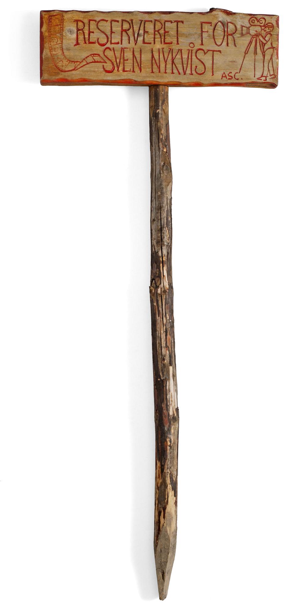SIGN, wood, from the movie-making of the film "Kristin Lavransdatter", Norwegian 1984. Director: Liv Ullmann.