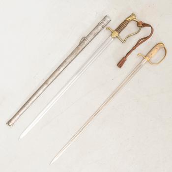 A Swedish sabre 1899 pattern with scabbard with another sword.