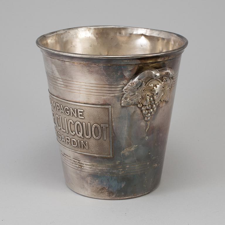 A SILVERED METAL CHAMPAGNE COOLER, mid 20th century.