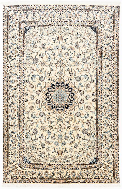 A carpet, Nain, part silk, fine 9 laa, signed, ca 327 x 210 cm.
