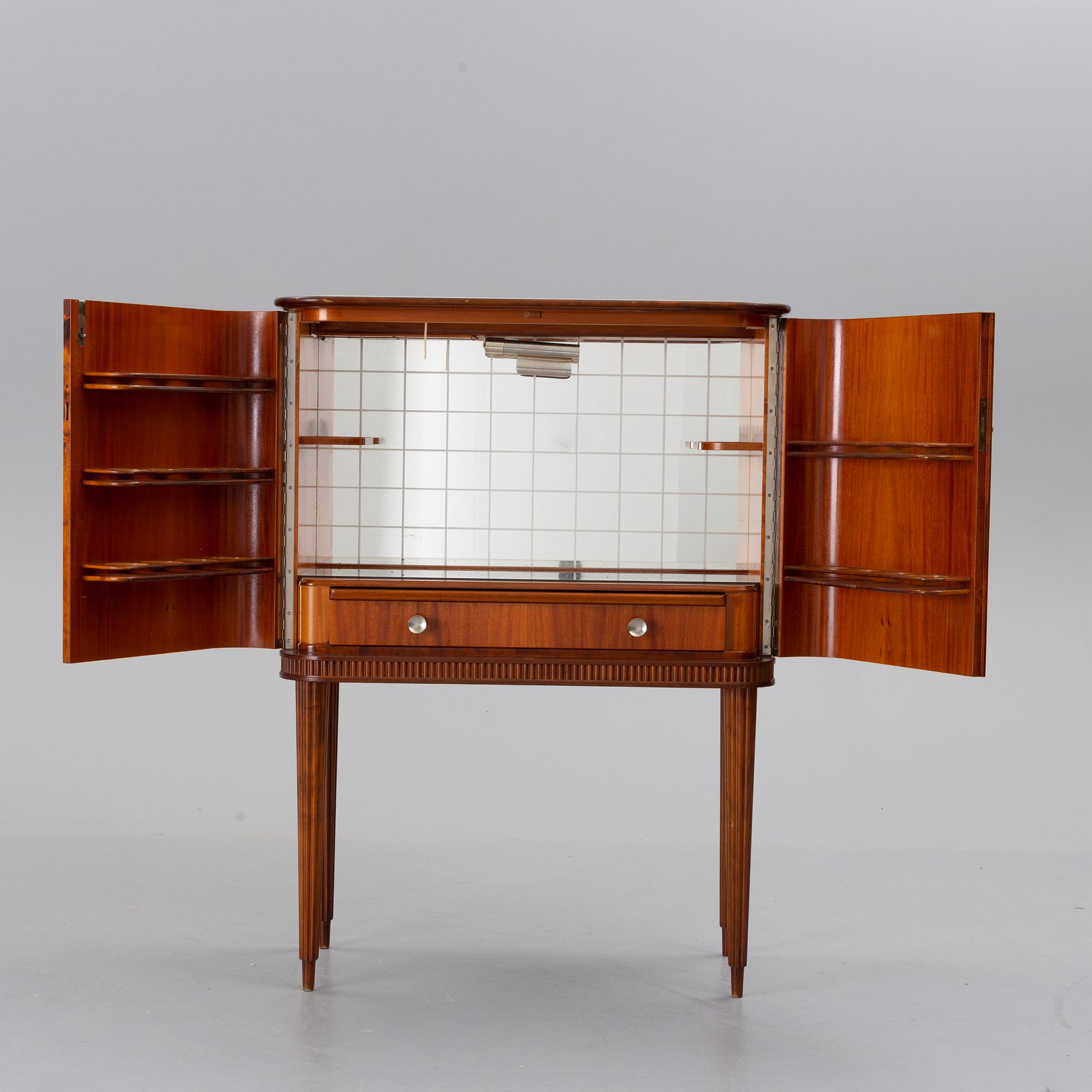 A mid 20th century drinking cabinet.
