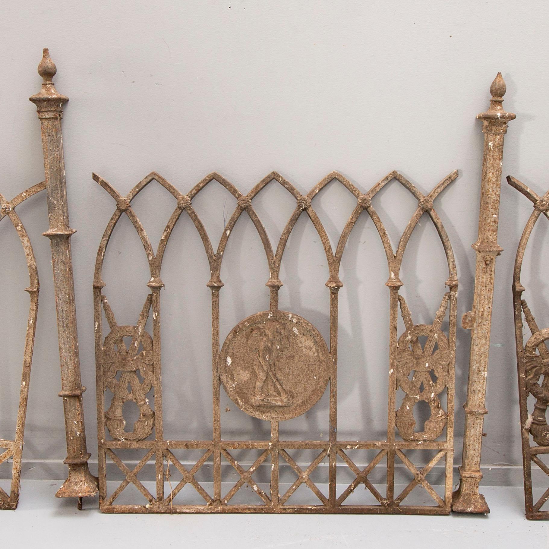 A three section cast iron Gothic fence around 1900.