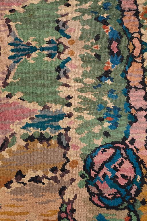 A CARPET, knotted pile, ca 488-491 x 347,5-350,5 cm, probably France, first third of the 20th century.