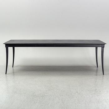 A metal Restoration Hardwood table, 21st Century.