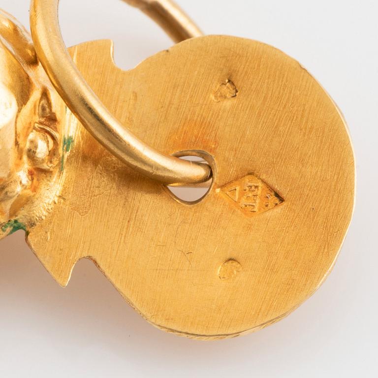 Hängsmycke 18K guld i form av ett kors.