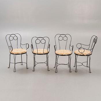 A set of four Grytgöl metal garden chairs mid 1900s.