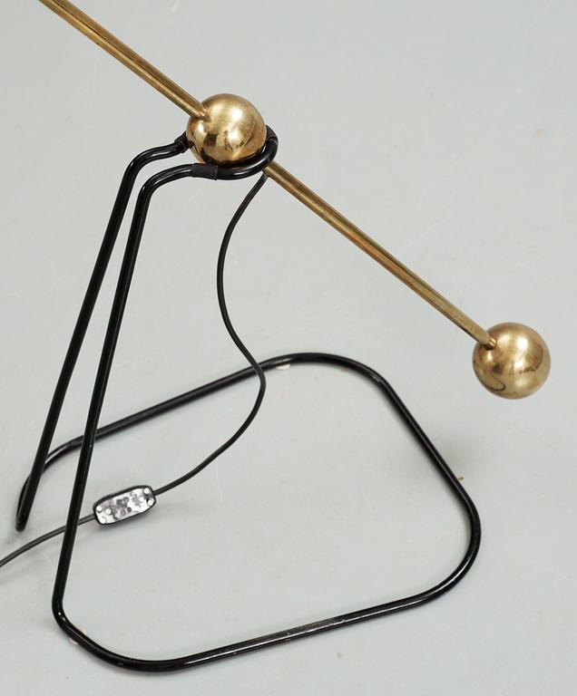 A Pierre Guariche brass and black lacquered metal 'Equilibrium' floor lamp,  France 1950's.