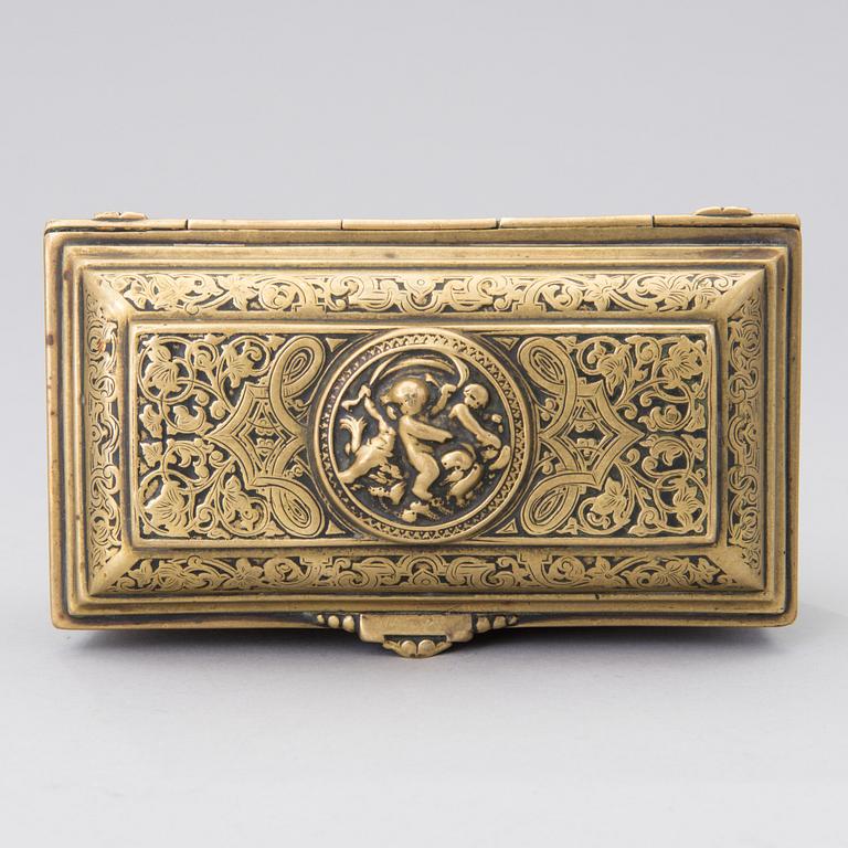 A Renaissance style brass box, Adolf Frankau & Co, London, from the late 19th century.