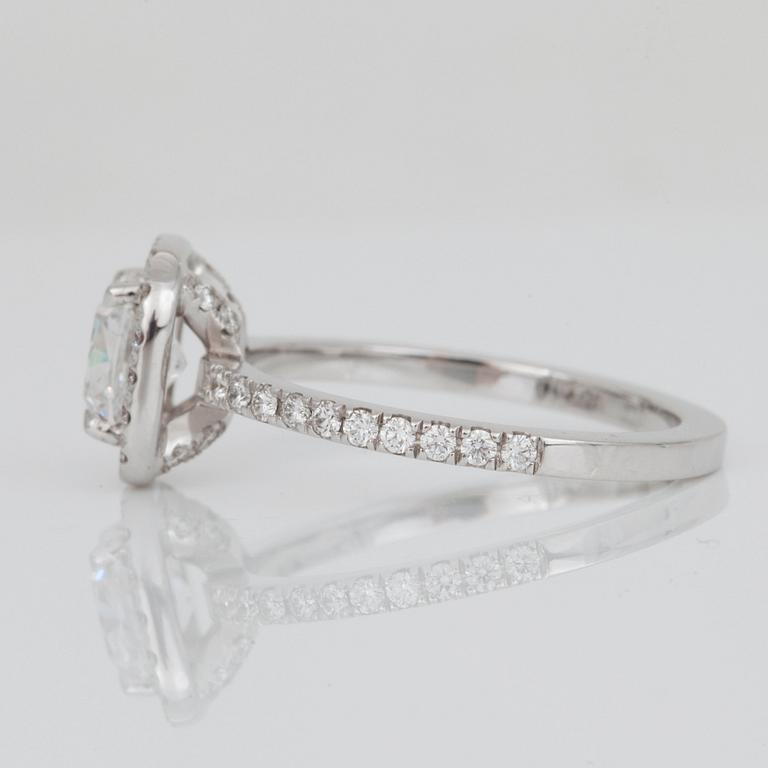 A cushion-cut 1.04 cts D/IF according to GIA cert, pavé set diamonds 0.45 ct in total, ring.