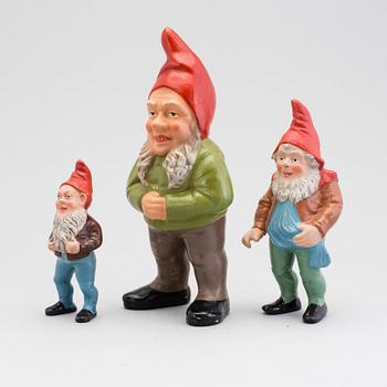 Three painted terracotta santa claus figurines from the first half of the 20th century.