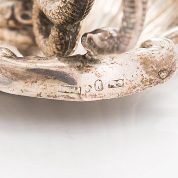 A pair of mid-19th-century silver night candle holders from Sweden.