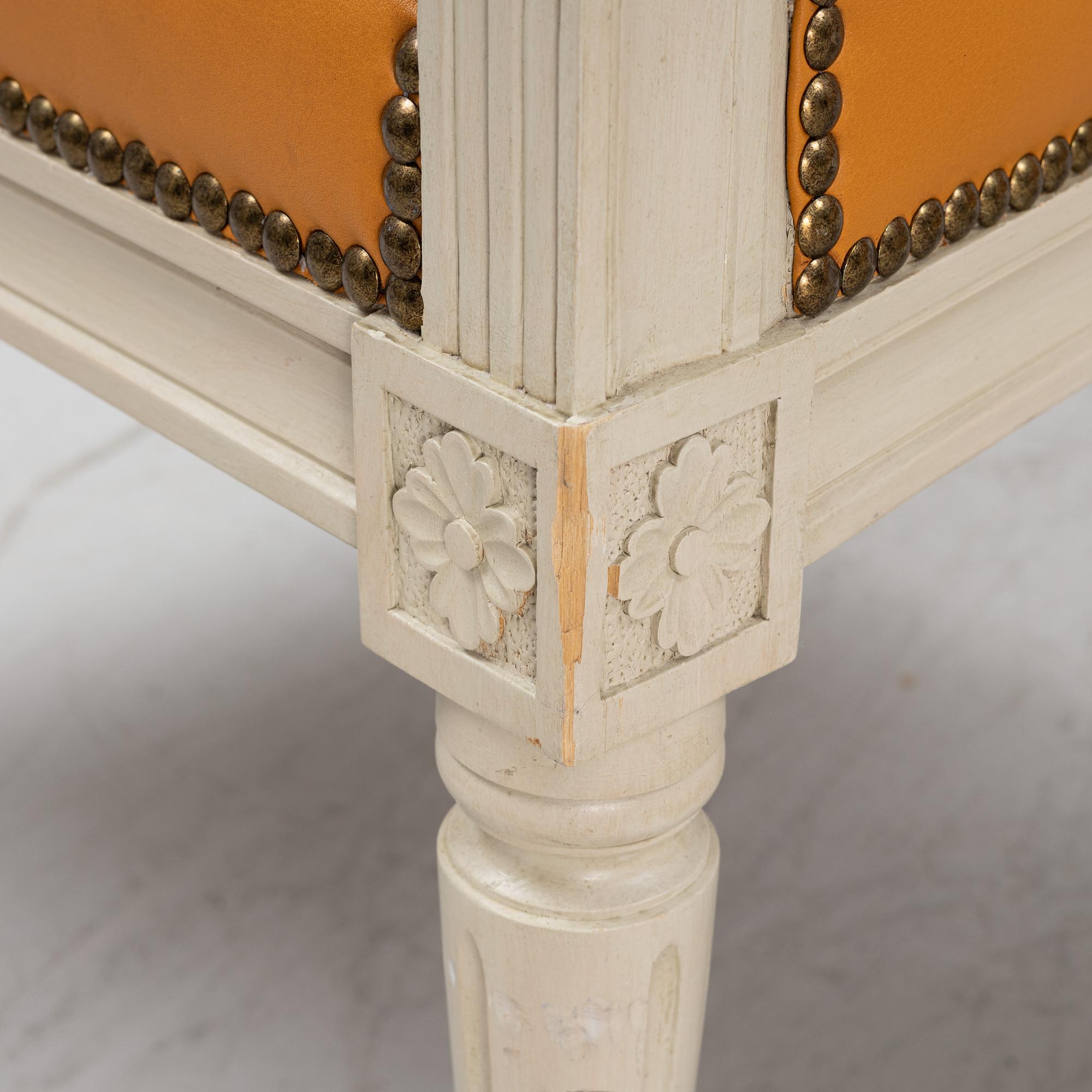 A pair of Gustavian style armchairs, end of the 20th Century.