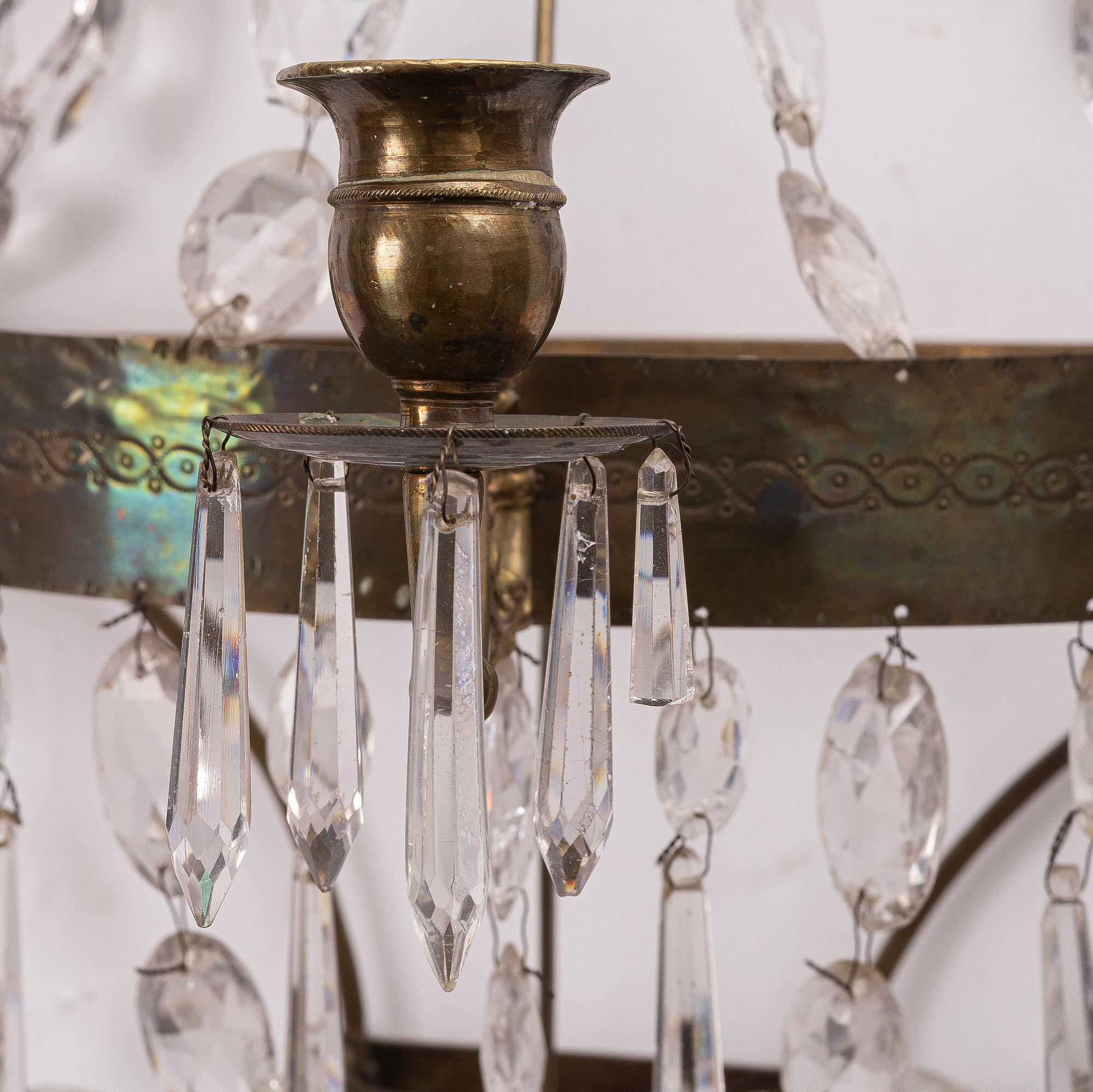 Wall lights, a pair, for three candles, 19th century, Empire style.