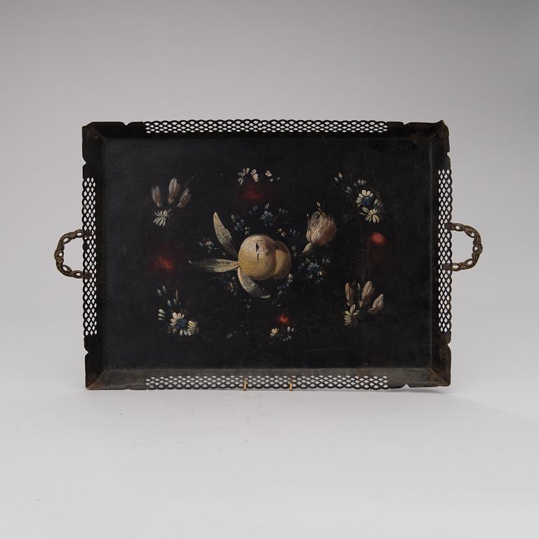 A painted metal tray from the 19th century.