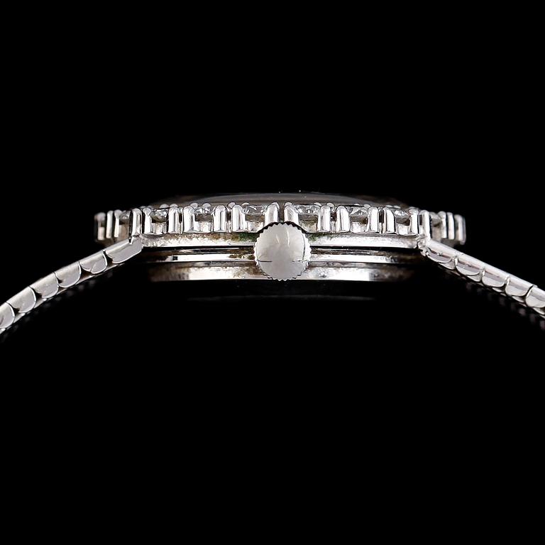 DAMARMBANDSUR, Bucherer, 18K vitguld, briljantslipade diamanter tot ca 4.62 ct. Total vikt ca 37 g.