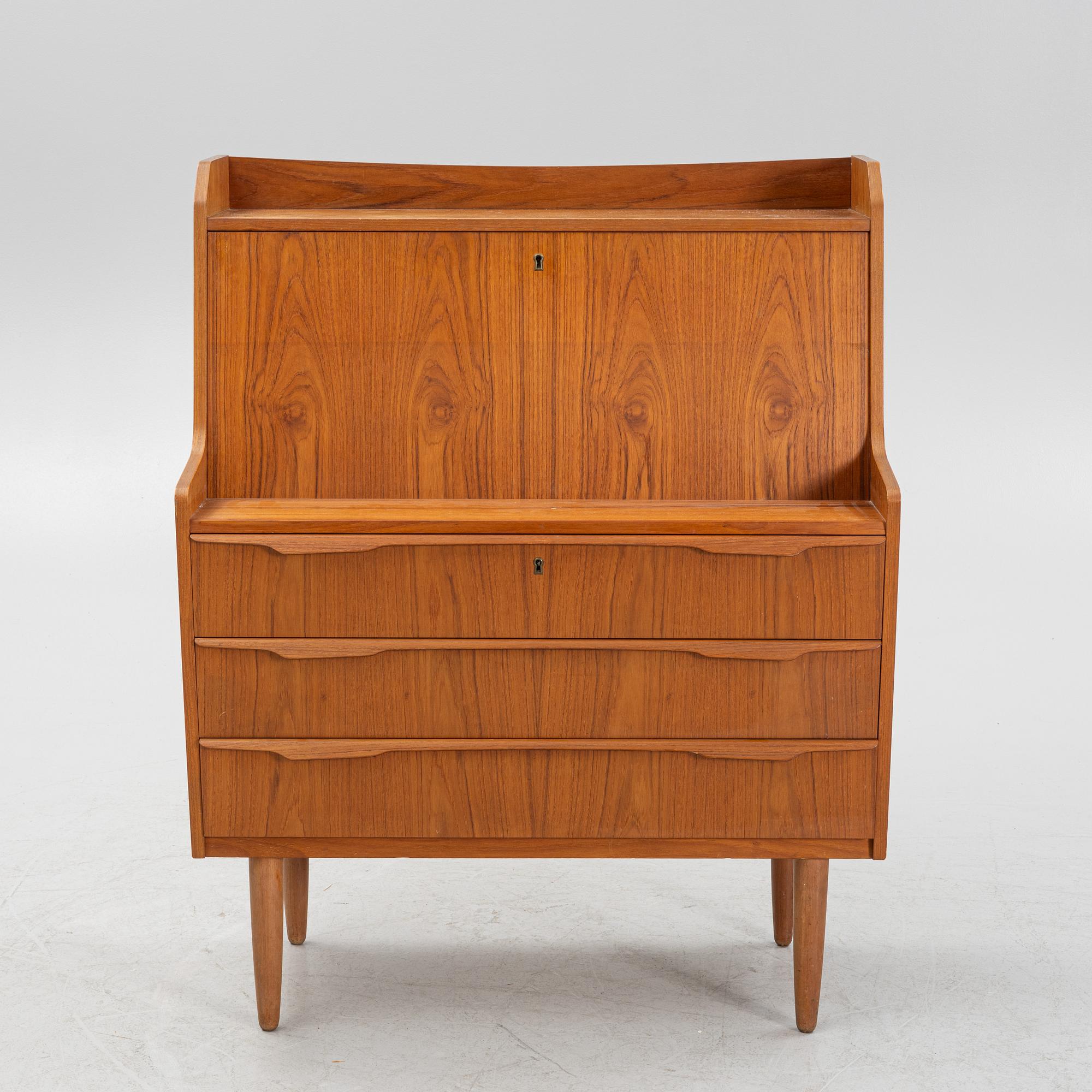 A teak writing desk, 1950-60s.