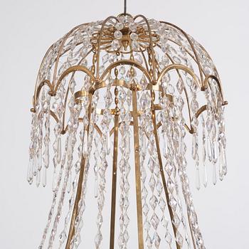 A late Gustavian gilt brass and cut glass thirteen-light chandelier, circa 1800.