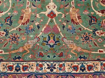 A carpet, a semi-antique Tabriz, ca 374-376,5 x 268-276 cm.