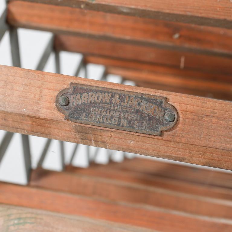 A wine rack from Farrow & Jackson, England, 20th century.