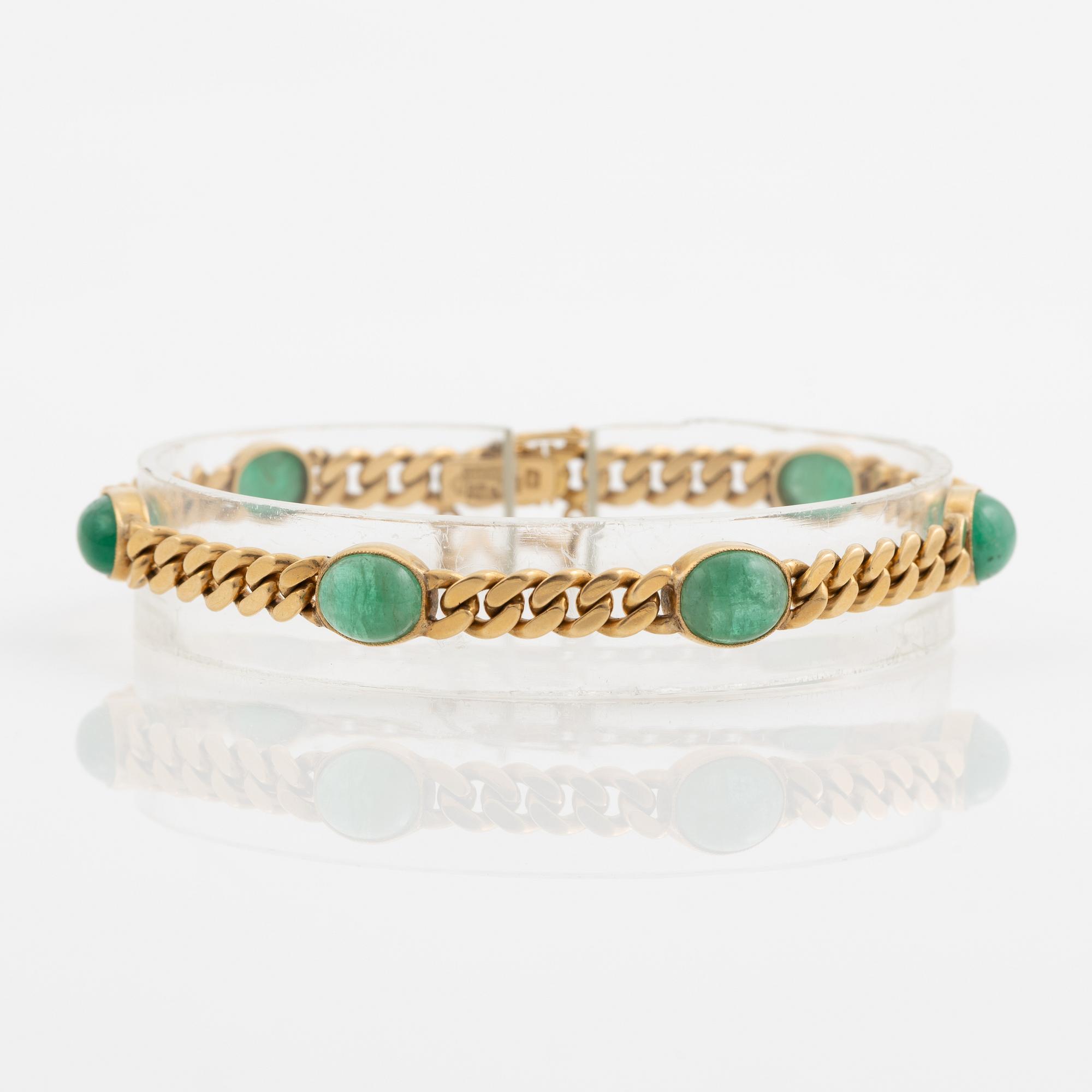 Bracelet in 18K gold with cabochon-cut emeralds, 1920s.