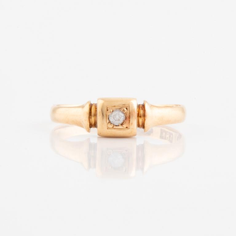 Faceted white stone ring.