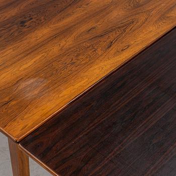 A rosewood veneered dining table, 1960's/70's.