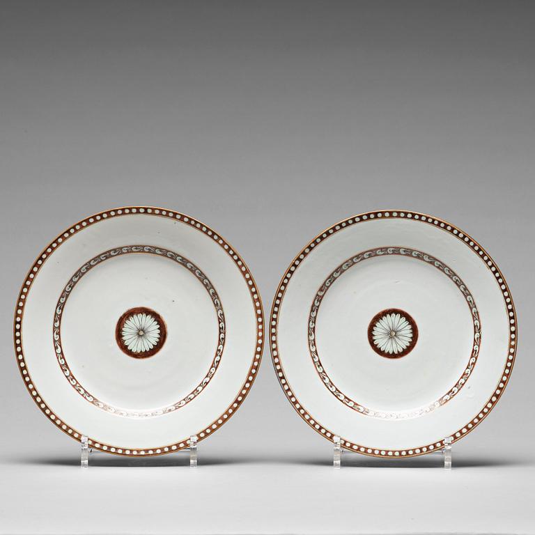 A pair of blue and white plates, Qing dynasty, Qianlong (1736-95). With the year 1789 written to the reverse.