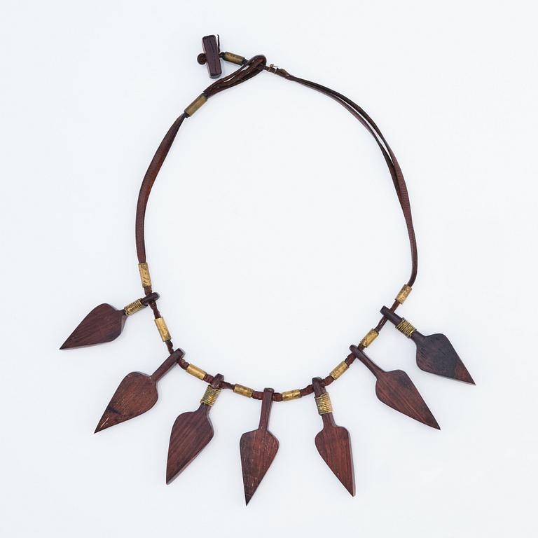 Vivianna Torun Bülow-Hübe, a leather, wood and brass necklace, executed in her own studio, Stockholm ca 1950.