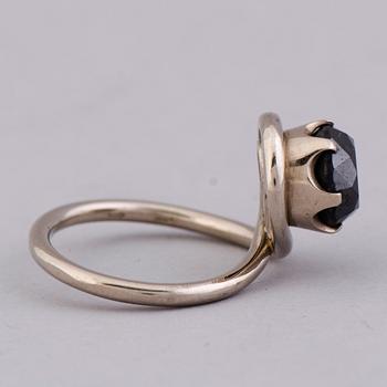 A RING, brilliant cut black diamond, 14K white gold.