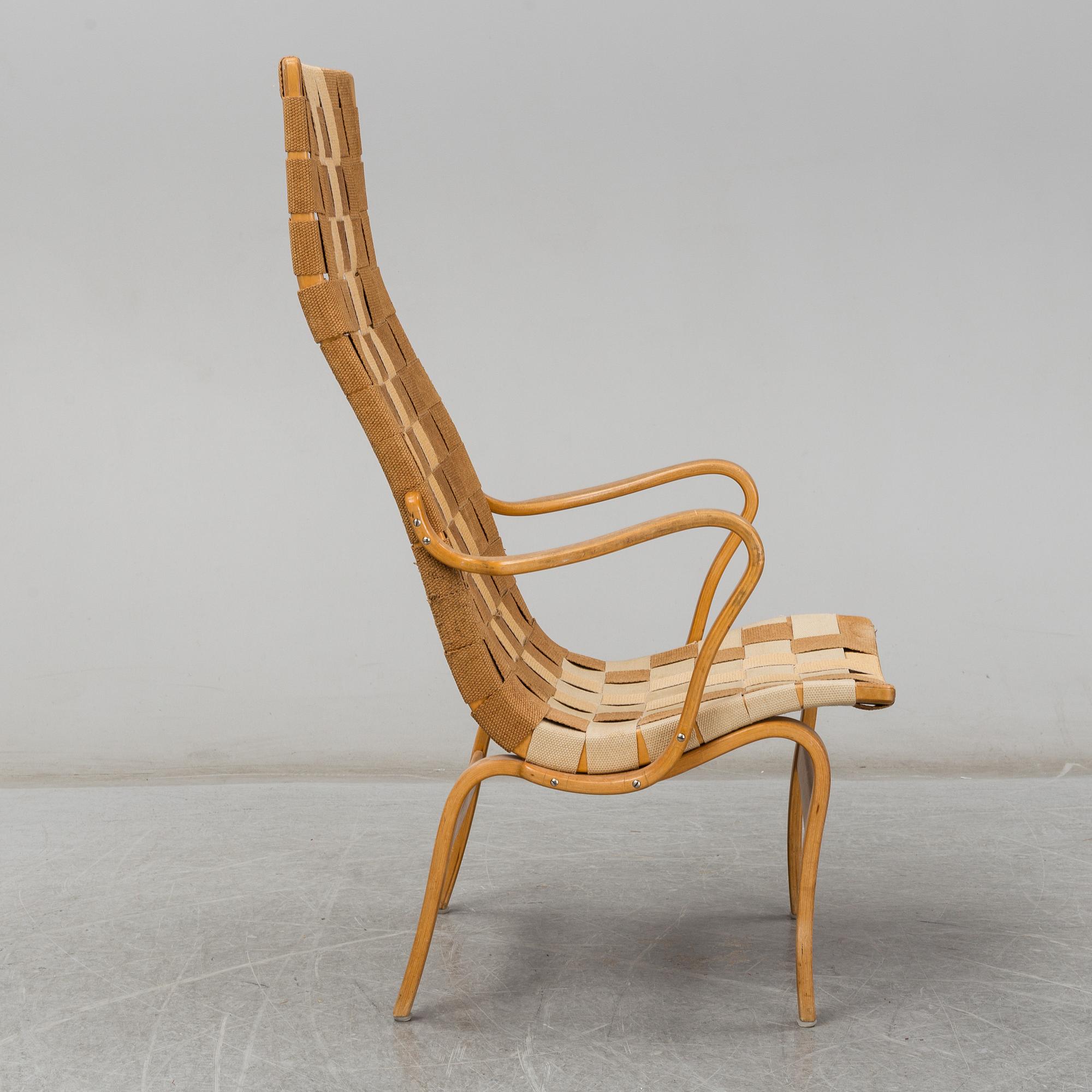 A armchair, model "Eva hög", designed by Bruno Mathsson for Firma Karl Mathsson, dated 1941.