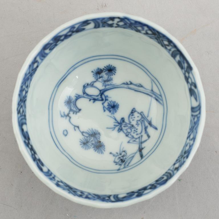 Three (a pair + one) blue and white cups with saucers, China, Kangxi (1662-1722).