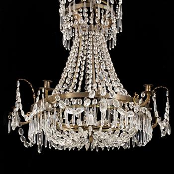 An early 20th century empire style chandeliere.