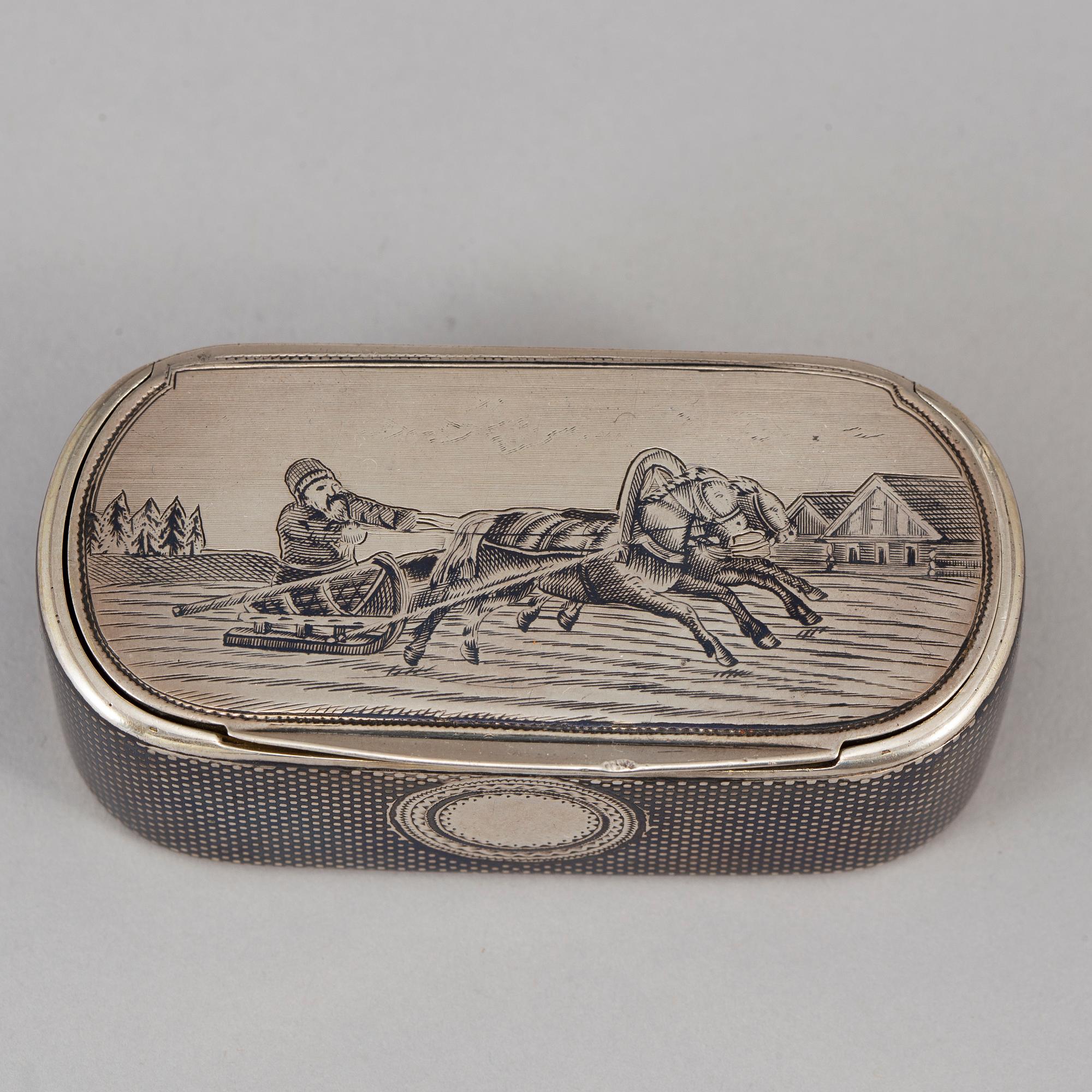 A Russian parcel-gilt silver and niello box, mark of Gustav Klingert, Moskva 1876.