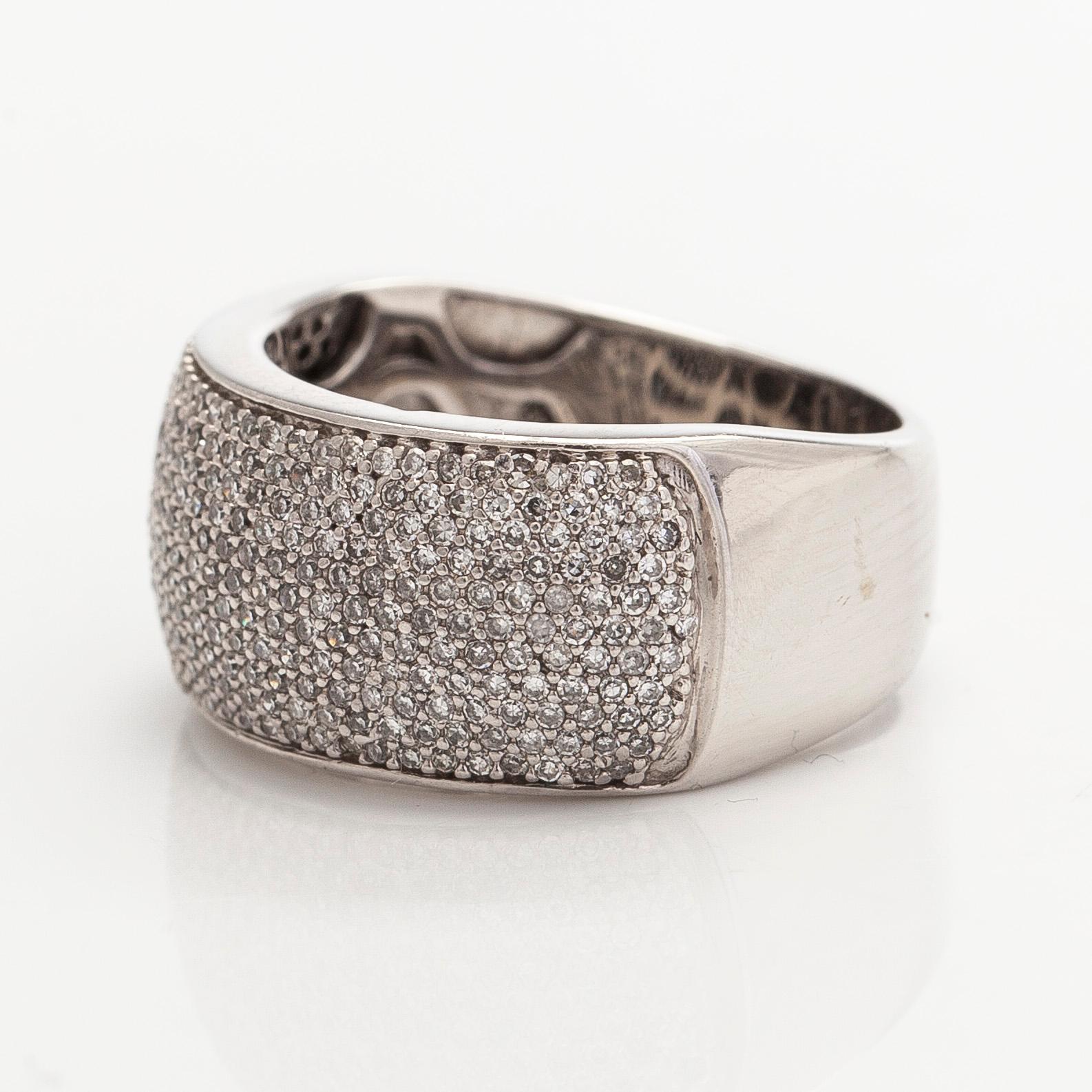 Sormus, 14K valkokultaa ja 8/8-hiottuja timantteja.