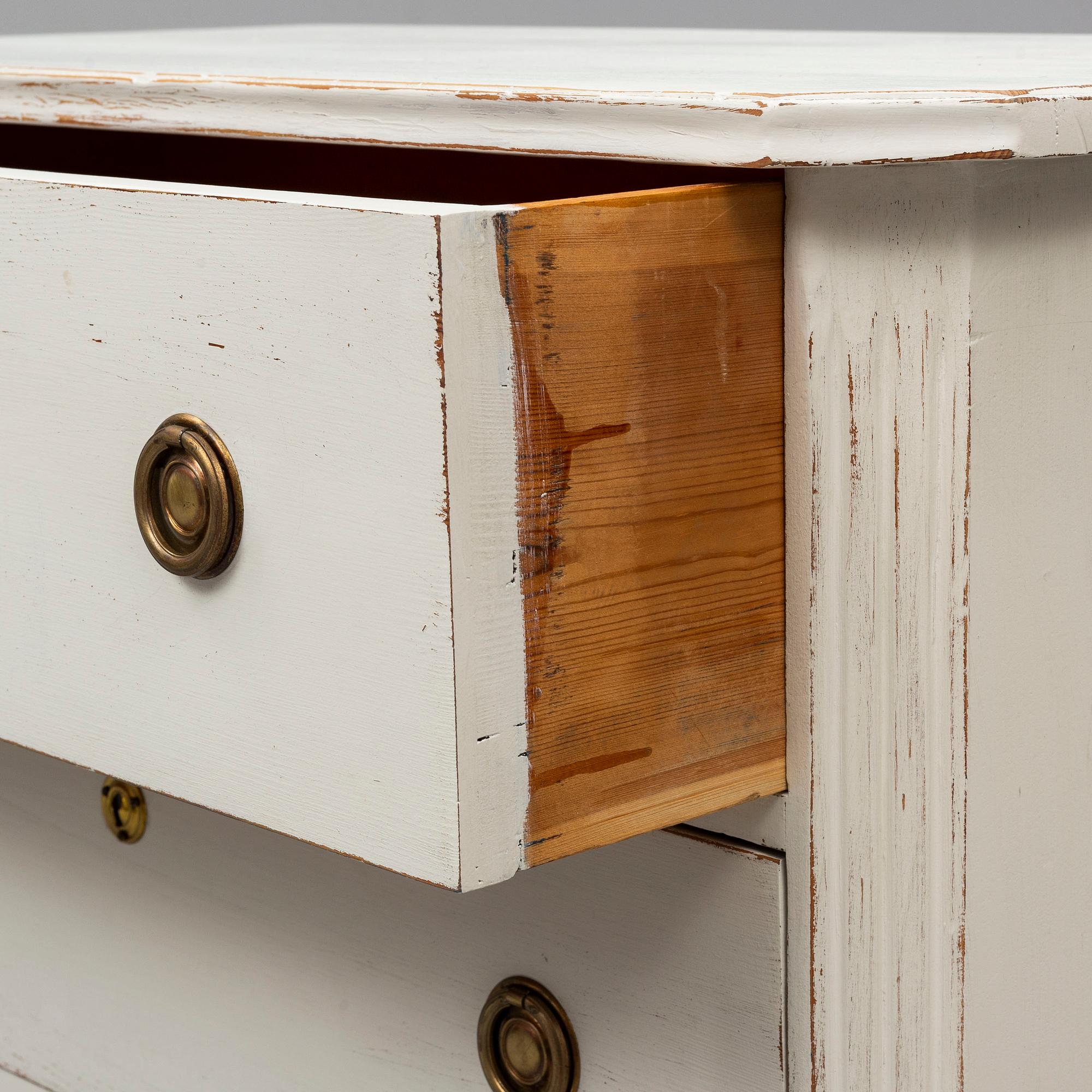 a gustavian style chest of drawers from the first half of the 20th century.