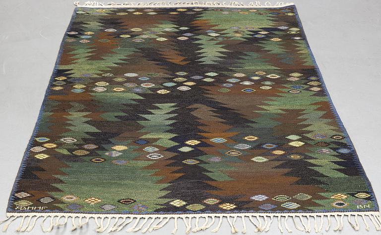 Barbro Nilsson, a carpet, "Tånga brun och grön", flat weave, ca 223 x 153-155 cm, signed AB MMF BN.