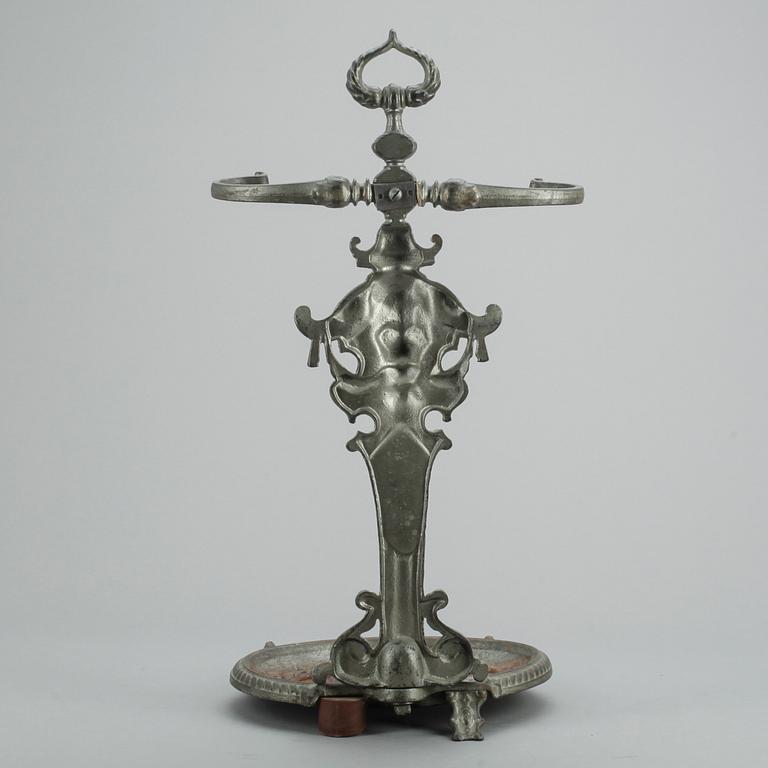 PARAPLYSTÄLL, gjutjärn, omkring sekelskiftet år 1900.