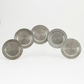 Five pewter plates, of which four Firma Svenskt Tenn, Stockholm.