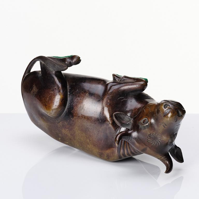 A bronze sculpture of a reclining buffalo, Qing dynasty, 19th Century.
