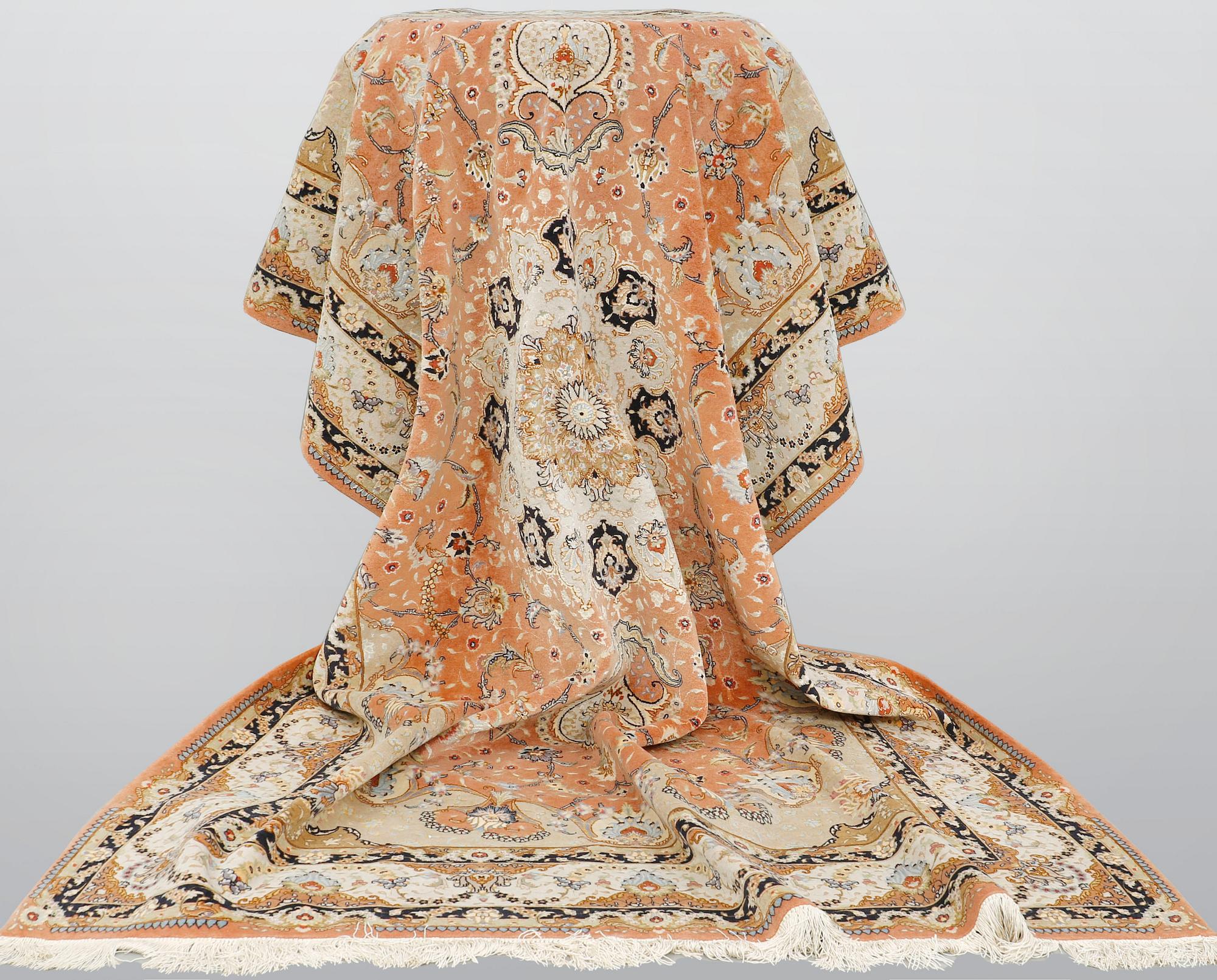 A part silk Tabriz carpet, so called 50 Raj, c 301 x 200 cm.