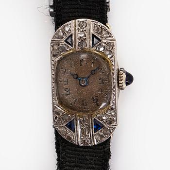 Wristwatch, 25 x 13 mm, Art Deco, rose cut diamonds, faceted sapphires, 18K white gold.