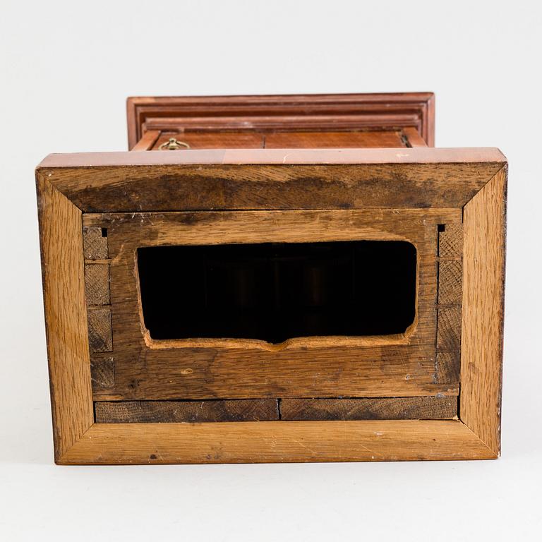 A French Empire mahogany mantle clock by Alexandre à Paris, first half of the 19th Century.