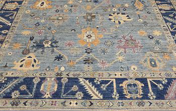 A carpet, Ziegler design, approx. 302 x 250 cm.