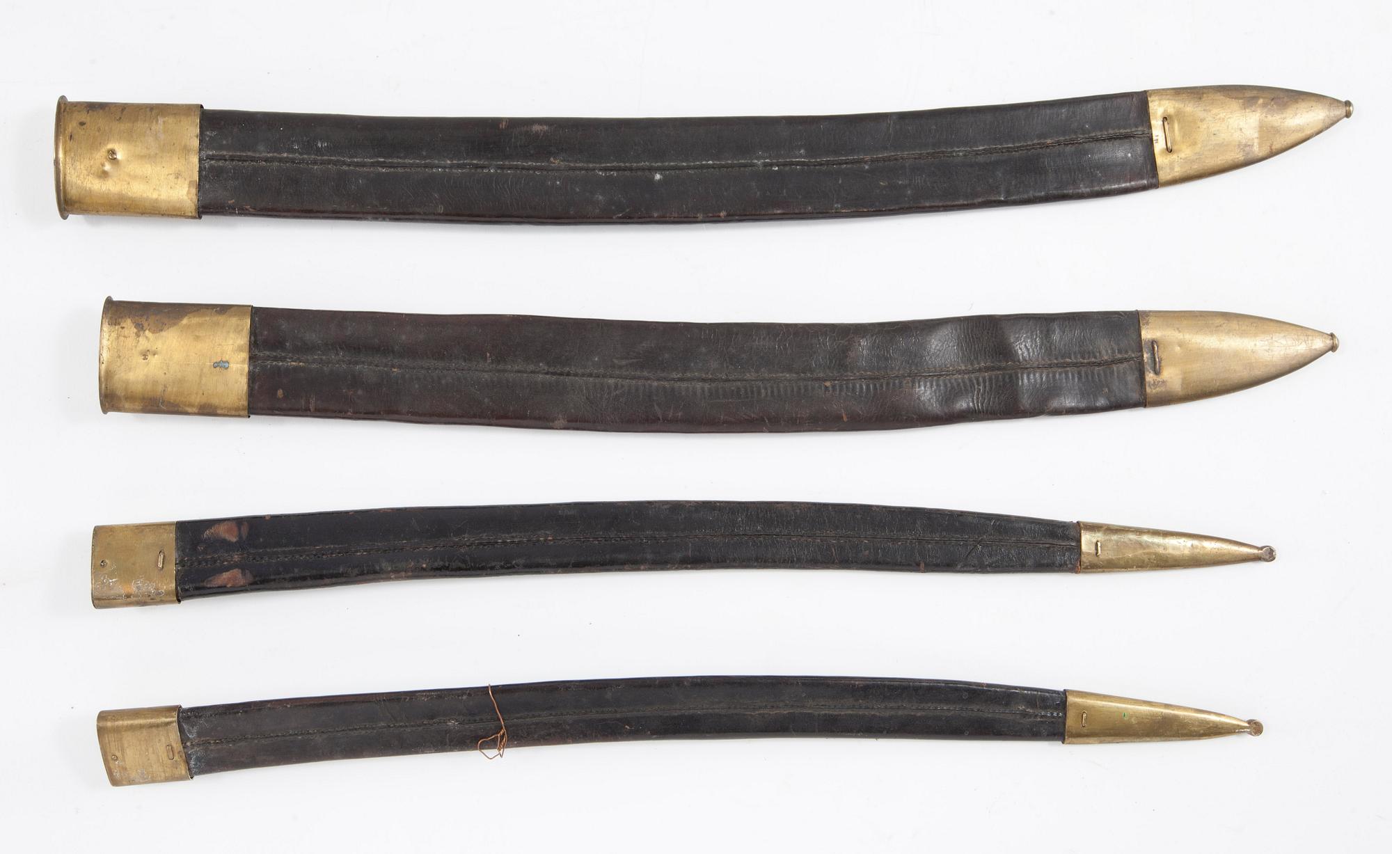 SABELBALJOR, 4 st, läder och mässing, Sverige, 1800-tal.