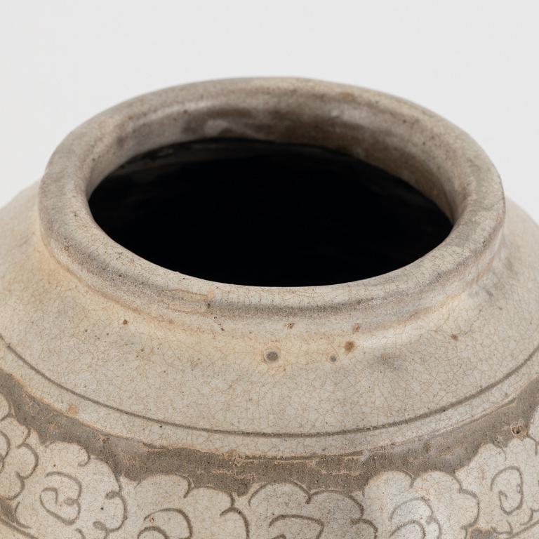 A Chinese glazed stoneware jar, probably Ming dynasty (1368–1644).