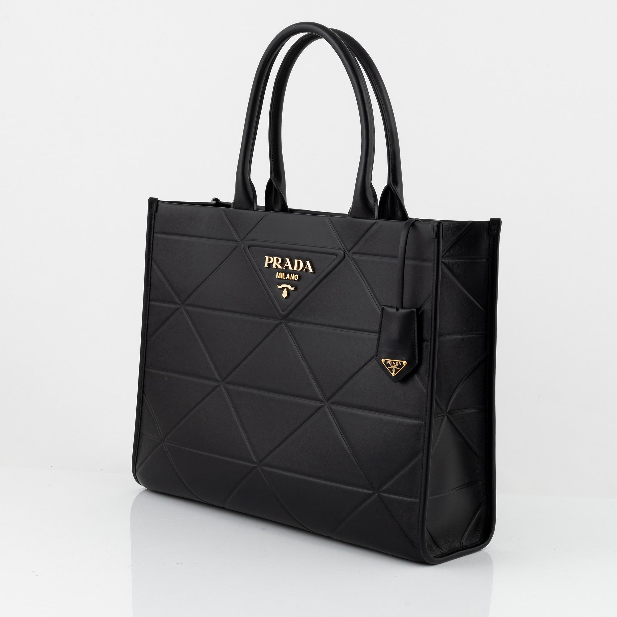 Prada, a black leather bag.