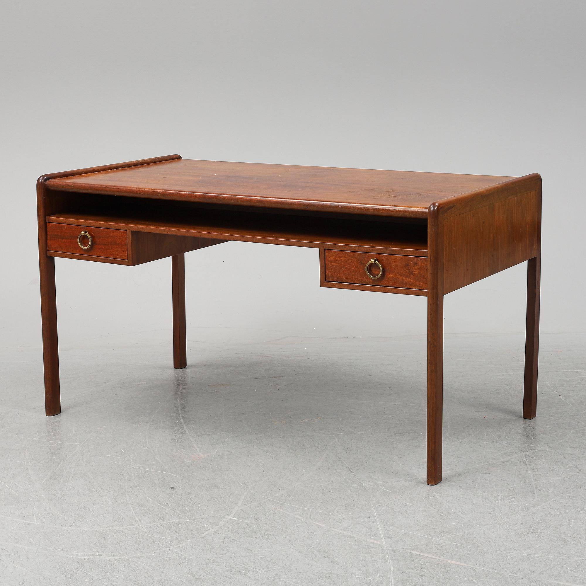 A mahogany desk, mid 20th Century.