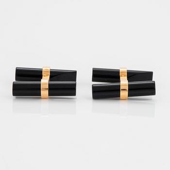 Cartier ett par manschettknappar 18K guld och onyx.